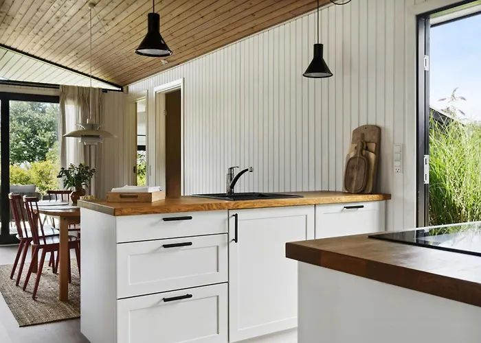 Feriehus Find Peace In Cosiest Setting With Sea Glimpse *