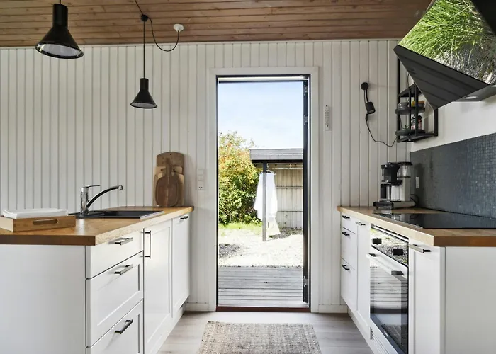 Feriehus Find Peace In Cosiest Setting With Sea Glimpse