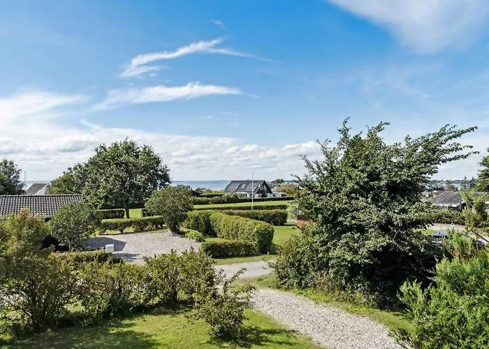 Feriehus Find Peace In Cosiest Setting With Sea Glimpse
